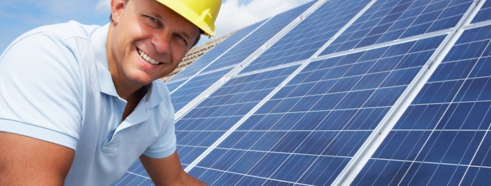 Man in hard hat working on solar installation in San Antonio, TX